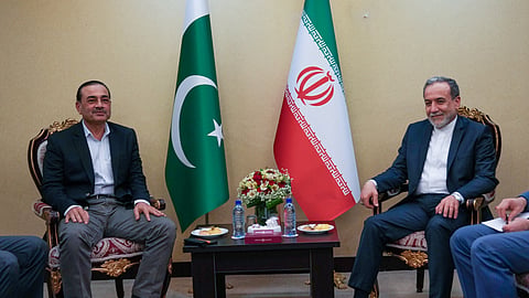 In this photo released by the Iranian Foreign Ministry, Iranian Foreign Minister Abbas Araghchi, right, meets with Pakistan's Army Chief Field Marshal Gen. Asim Munir in Tehran, Wednesday, April 15, 2026.
