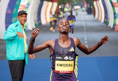Rodrigue Kwizera gets across the line on Sunday