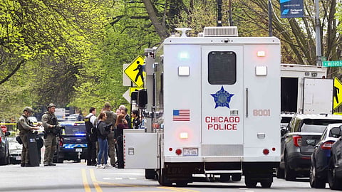 Police officers work the scene outside Endeavor Health Swedish Hospital in Lincoln Square, on Saturday, April 25, 2026.