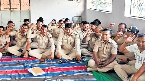Forest staff staging protest in Bargarh on Tuesday
