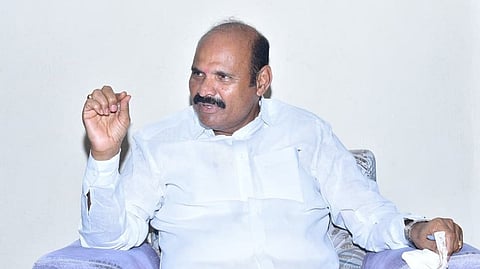 Minister for Housing and Information & Public Relations Kolusu Parthasarathy addressing a press conference at Karakampadu village in Pamarru mandal of Krishna district on Tuesday.