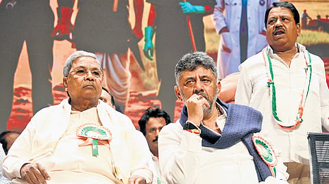 CM Siddaramaiah and DCM DK Shivakumar at a Labour Day event in Bengaluru on Friday