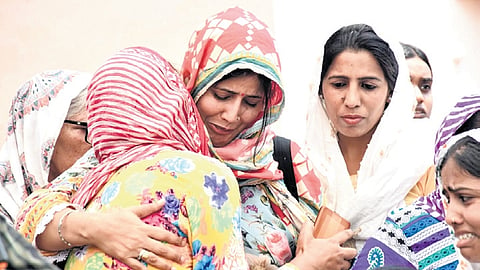 Family members in grief after mortal remains of victims arrived Delhi.