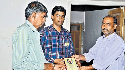Father of a successful student being feted