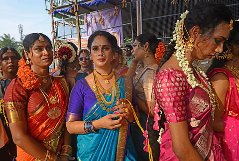 Trans women dressed as brides