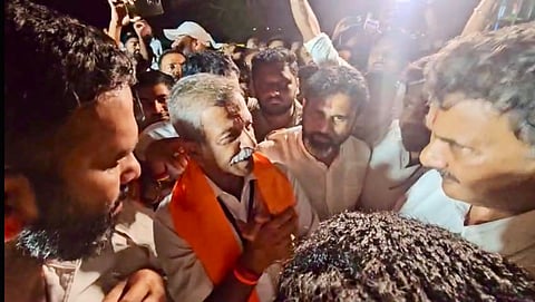 Jeevaraj with his supporters in Chikkamagaluru after the completion of recounting of votes.