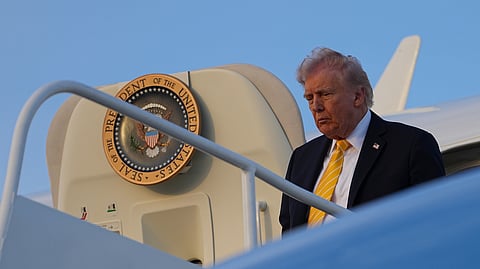 US President Donald Trump arrives on Air Force One at Miami International Airport, in Miami, Saturday, May 2, 2026.