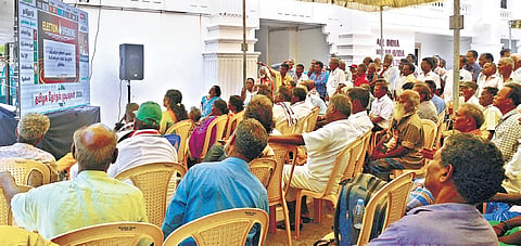 AIADMK supporters and workers watching the results on a big screen at the party office in Chennai on Monday.