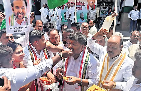 Congress cadre celebrate the party’s victory in Kerala Assembly elections, at Gandhi Bhavan in Hyderabad on Monday.