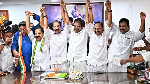 UDF leaders celebrate at the KPCC headquarters in Thiruvananthapuram following UDF's massive lead in Kerala State Assembly elections on Monday