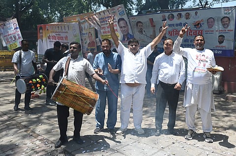 Congress workers in New Delhi celebrate the party's victory in the Kerala Assembly elections 2026, in New Delhi on Monday.