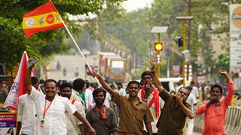 TVK supporters are seen celebrating the victory for their party at Madurai on Monday.