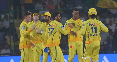 CSK's Akeal Hosein (2R) celebrates a wicket on Tuesday