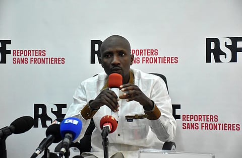 In this photo released by Reporters Without Borders, Burkinabe journalist Atiana Serge Oulon speaks at a news conference in Dakar, Senegal, on April 3, 2023.