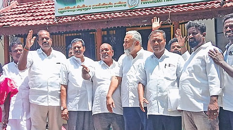 Party workers staging a protest against PCC president V Vaithilingam.
