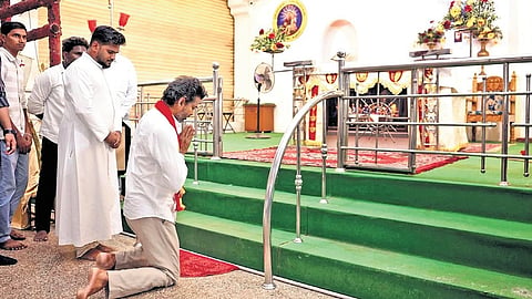TVK president C Joseph Vijay offering prayers at the St Anthony’s Church in Tiruchy just days before the election results.