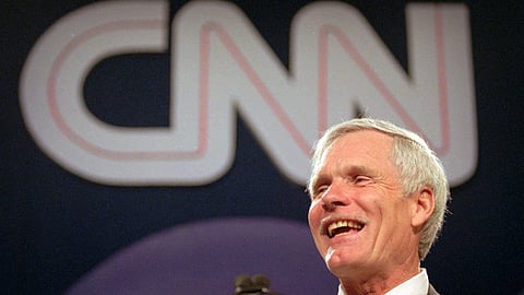 FILE - Ted Turner speaks during the CNN World Report Contributors banquet in Atlanta on May 4, 1995.