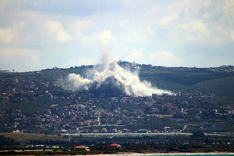 This photograph taken from the southern Lebanese area of Tyre shows smoke as it rises from the site of an Israeli airstrike that targeted the village of al Mansouri on May 6, 2026.