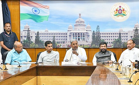 Chief Minister Siddaramaiah and Congress leaders at a press conference at his home-office Krishna in Bengaluru on Tuesday.