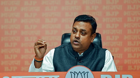 BJP national spokesperson Sambit Patra addresses the press conference at party headquarters in New Delhi.