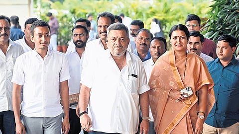 Newly elected MLA from Davanagere South, Samarth Shamanur (left), accompanied by his parents — Horticulture Minister SS Mallikarun and Davanagere MP Prabha Mallikarjun — arrives at Vidhana Soudha on Thursday.