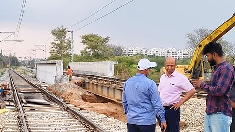 East City Corporation Commissioner D S Ramesh inspects the railway vent work at Geddalahalli on Thursday.