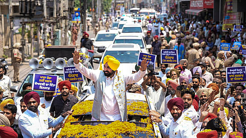 In this image posted on May 8, 2026, Punjab Chief Minister Bhagwant Mann waves to the crowd during the third day of 'Shukrana Yatra', in Bhatinda, Punjab.