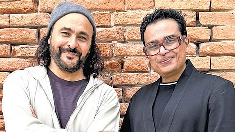 French Algerian artist Kader Attia (L) with Biennale president Jitish Kallat in Venice.