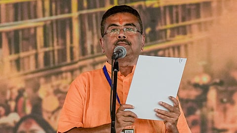 BJP leader Suvendu Adhikari takes the oath to become West Bengal's first BJP Chief Minister, at Brigade Parade Ground in Kolkata, West Bengal, Saturday, May 9, 2026.