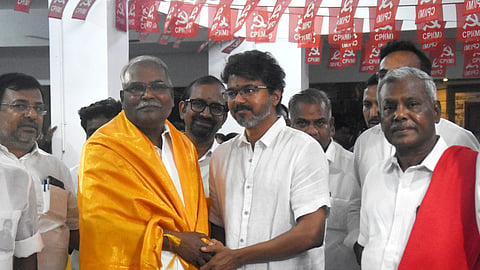 TVK chief Vijay being welcomed by CPI(M) Tamil Nadu state secretary P Shanmugam and senior party leaders during the former's visit to the CPI(M) headquarters, in Chennai, Friday.