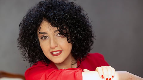 This photo provided by the Narges Mohammadi Foundation shows Narges Mohammadi posing for a portrait in Tehran, Iran, on Feb. 9, 2025.