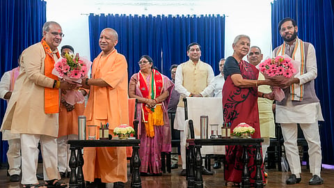 Uttar Pradesh Governor Anandiben Patel and state Chief Minister Yogi Adityanath during the expansion event of the state government, in Lucknow, Sunday, May 10, 2026.