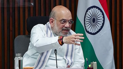 Union Home Minister Amit Shah speaks at a meeting with officials over heat wave and flood management preparations, in New Delhi on Sunday.