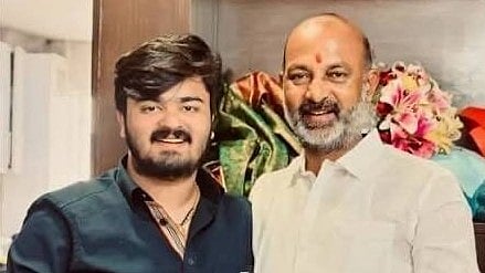 Minister of State Bandi Sanjay Kumar with his son Bandi Bhageerath Sai.