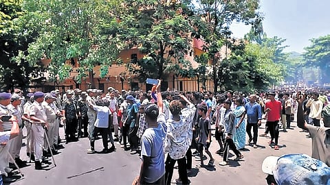Locals agitating in front of the Rayagada Town police station on Monday.