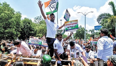 Odisha Pradesh Congress Committee leaders take out a protest against over Balianta mob lynching case outside Police Commissionerate Office in Bhubaneswar on Monday.