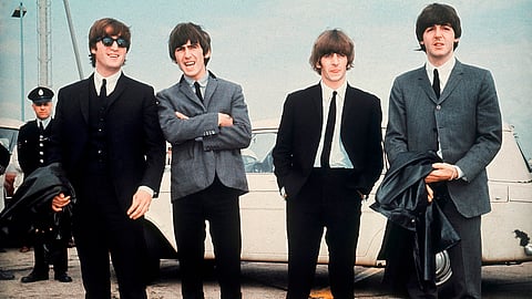 The Beatles, from left, John Lennon, George Harrison, Ringo Starr and Paul McCartney, arrive in Liverpool, England on July 10, 1964, for the premiere of their movie "A Hard Day's Night."