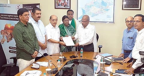 A BJD delegation submitting a memorandum to CEO RS Gopalan on Monday.