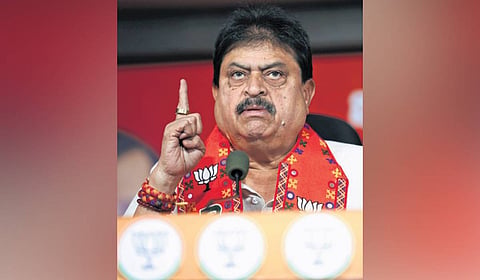 BJP state president N Ramchander Rao gestures as he addresses a press conference in Hyderabad on Monday.