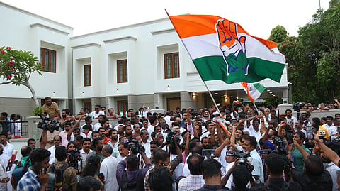 Congress workers raise slogans in front of the residence of VD Satheesan’s in Aluva on Wednesday.