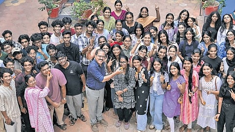 Teachers and students of Jyothis Central School, Kazhakkottam, celebrating after the results of the CBSE Class XII exams were published on Wednesday