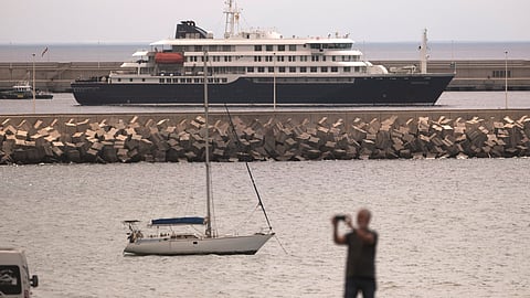 The hantavirus-stricken cruise ship MV Hondius is seen at anchor at the port of Granadilla in Tenerife, Canary Islands, Spain, Monday, May 11, 2026.