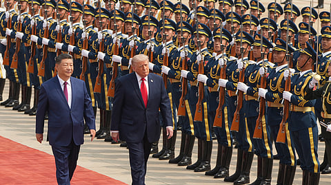 President Donald Trump participates in a welcome ceremony with China's President Xi Jinping at the Great Hall of the People, Thursday, May 14, 2026, in Beijing.