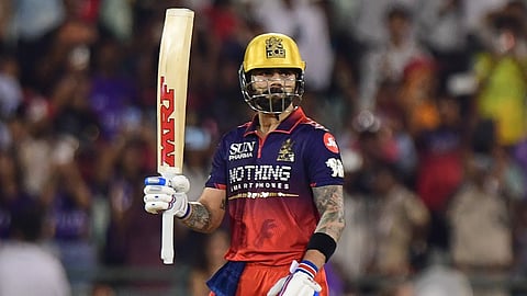 Virat Kohli celebrates his century during the Indian Premier League cricket match between Royal Challengers Bengaluru and Kolkata Knight Riders in Raipur, India, Wednesday, May 13, 2026.