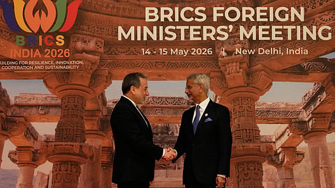 India's Foreign Minister S.Jaishankar, right, shakes hands with Iranian Foreign Minister Abbas Araghchi as he arrives for a two-day BRICS nations meeting in New Delhi, India, Thursday, May 14, 2026.