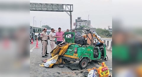 Police inspect the autorikshaw at the accident spot on Wednesday.