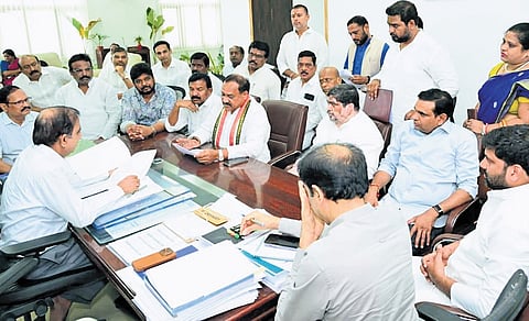 TPCC chief B Mahesh Kumar Goud, along with other Congress leaders, meets state CEO C Sudharshan Reddy at BRK Bhavan in Hyderabad on Friday.
