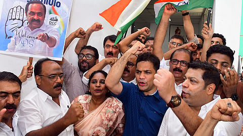 MP Hibi Eden, Mayor Minimol V K and other Congress leaders celebrating outside Ernakulam DCC office after the selection of V D Satheesan as chief minister.