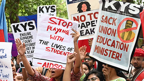 Students protesting against the NEET 2026 scam at jantar mantar in New Delhi on Thursday.