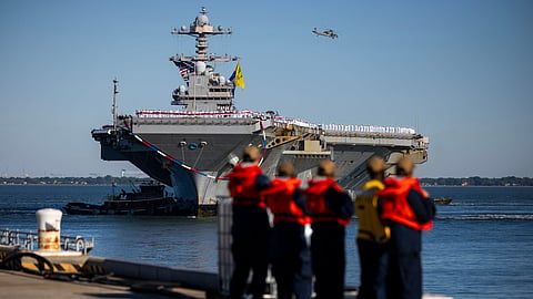 The USS Gerald R. Ford pulls up to Pier 11 at Naval Station Norfolk in Norfolk, Va. on Saturday, May 16, 2026, following an 11 month deployment.